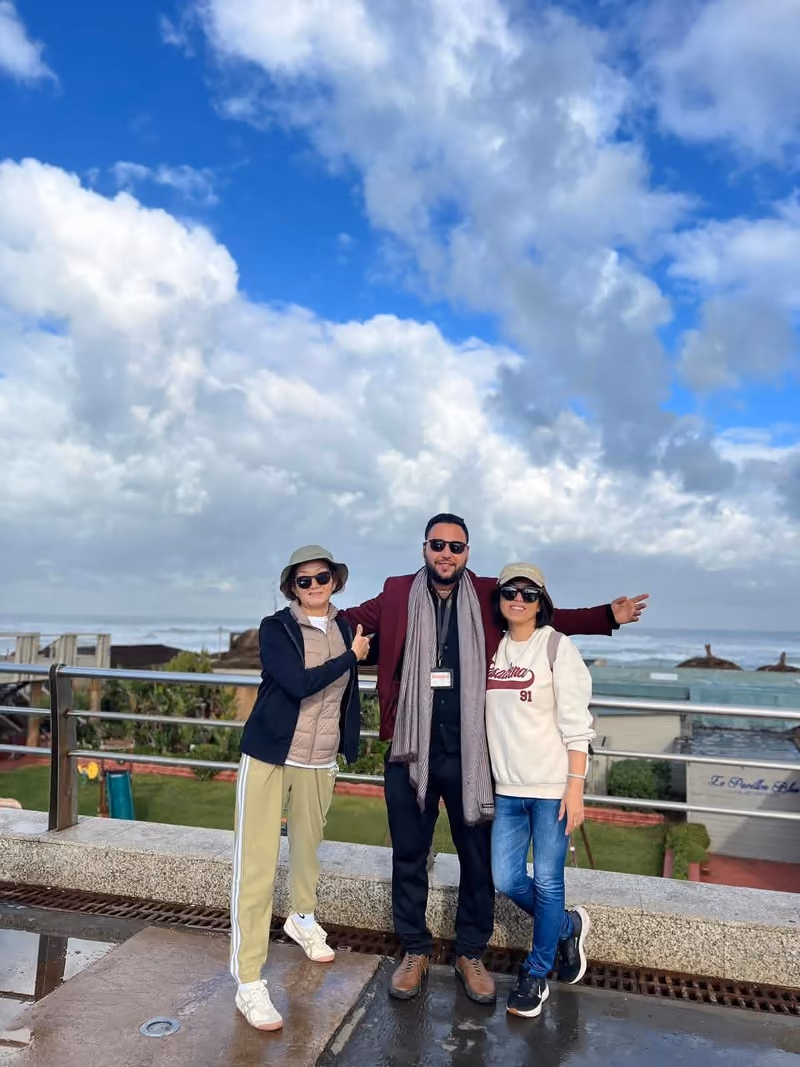 Guests with their guide on a breezy Atlantic coast terrace